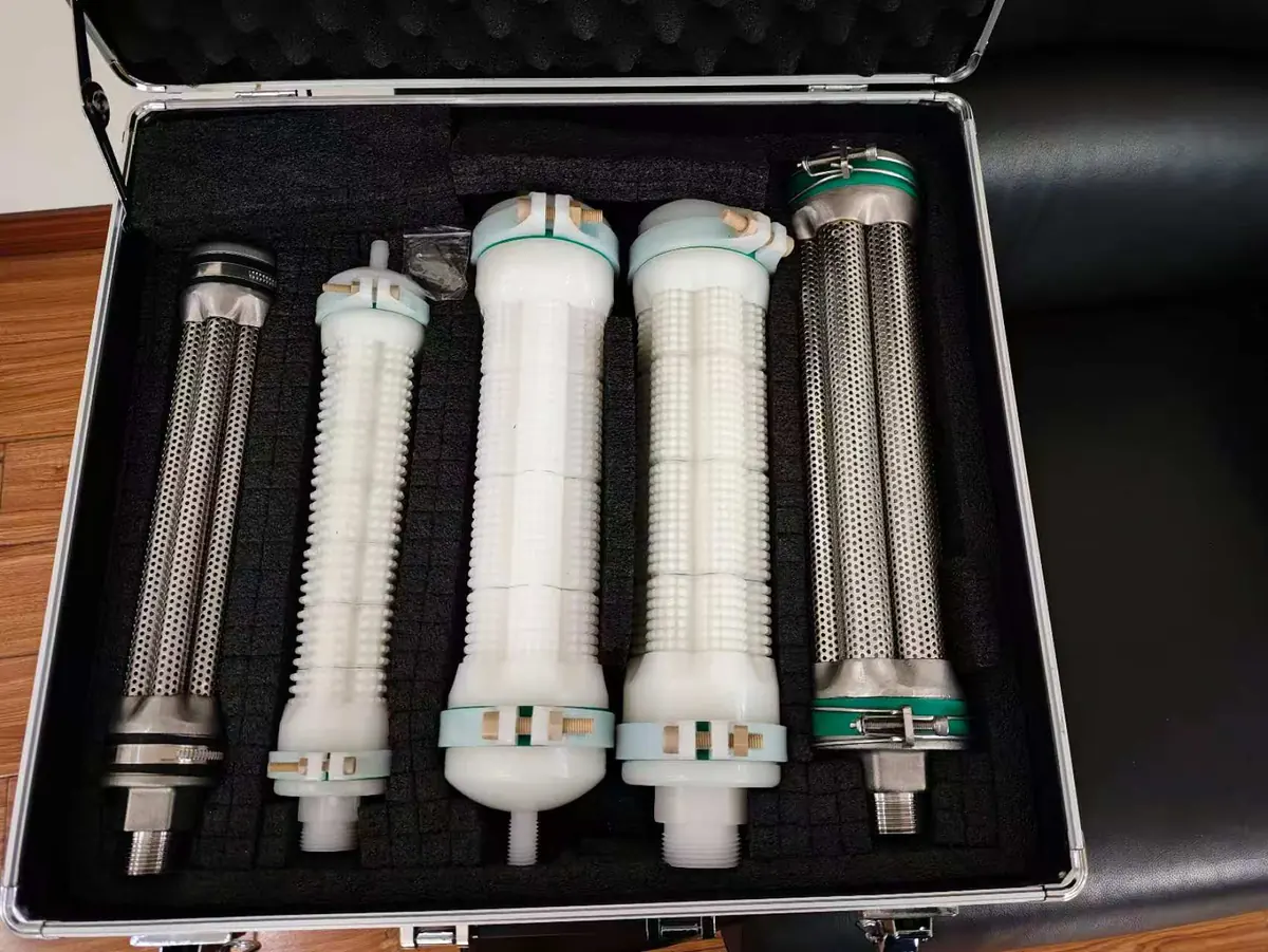 Representative polymer and stainless steel candle filter elements